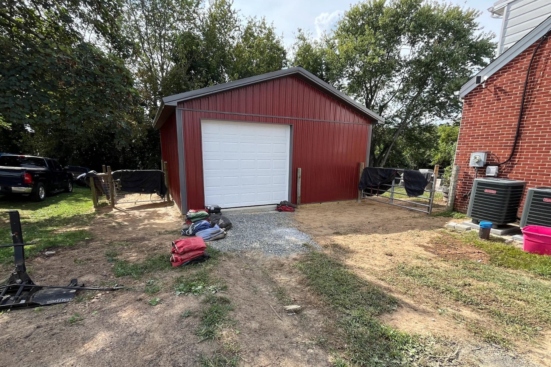 A red garage with a white door.