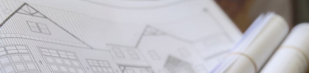 A close up of blueprints for a pole building.