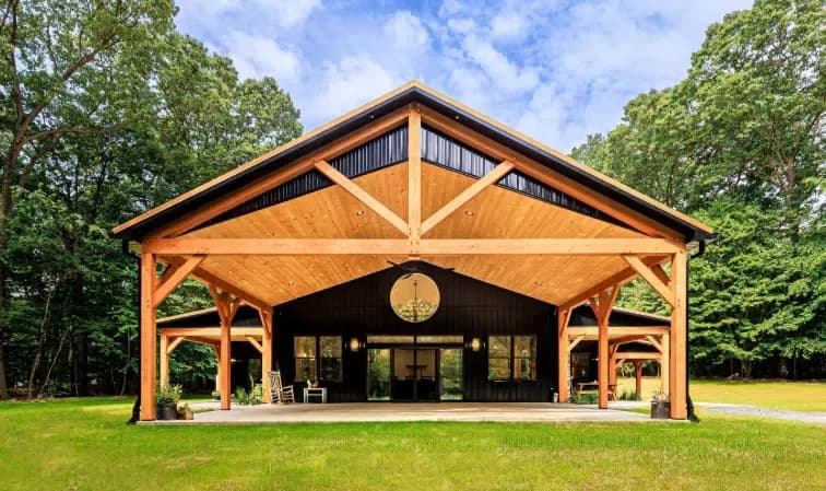 Pitched metal roof and deck overhang