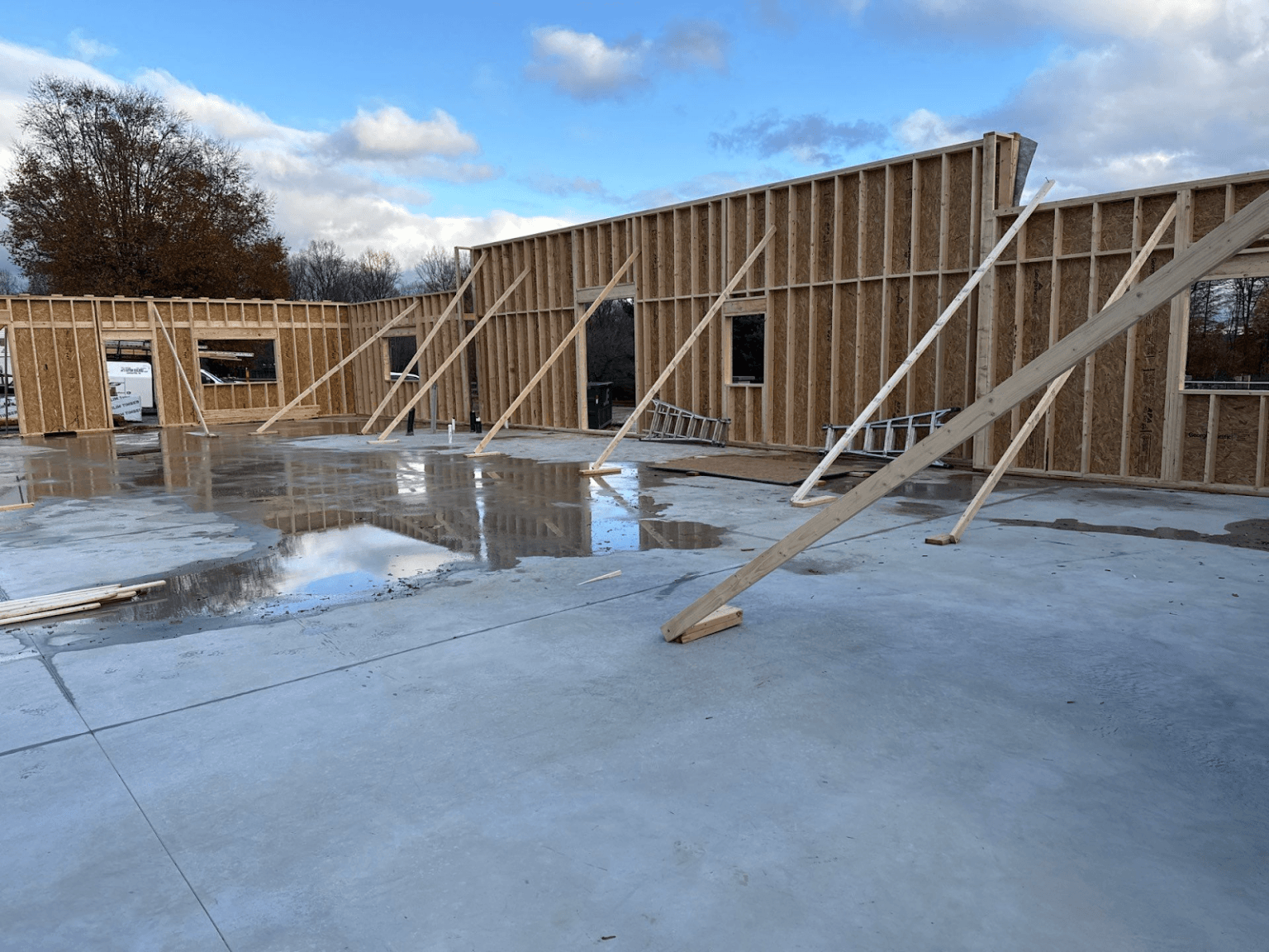 A post frame building under construction.